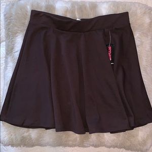 Brown flowy mini skirt. Never worn. NWT